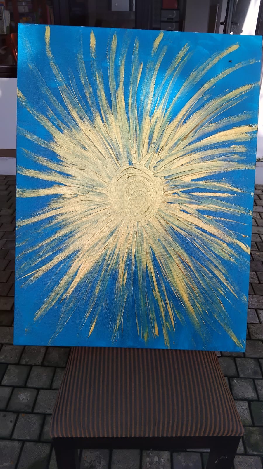 Radiant burst on cyan