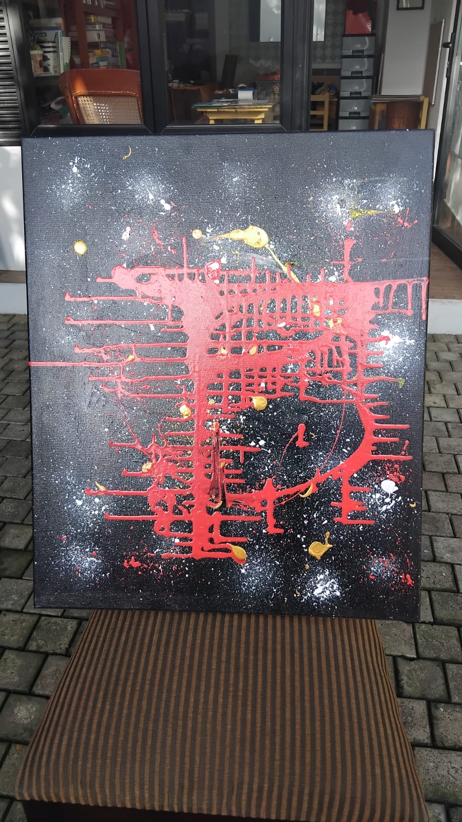 Black field with red grid & splatter